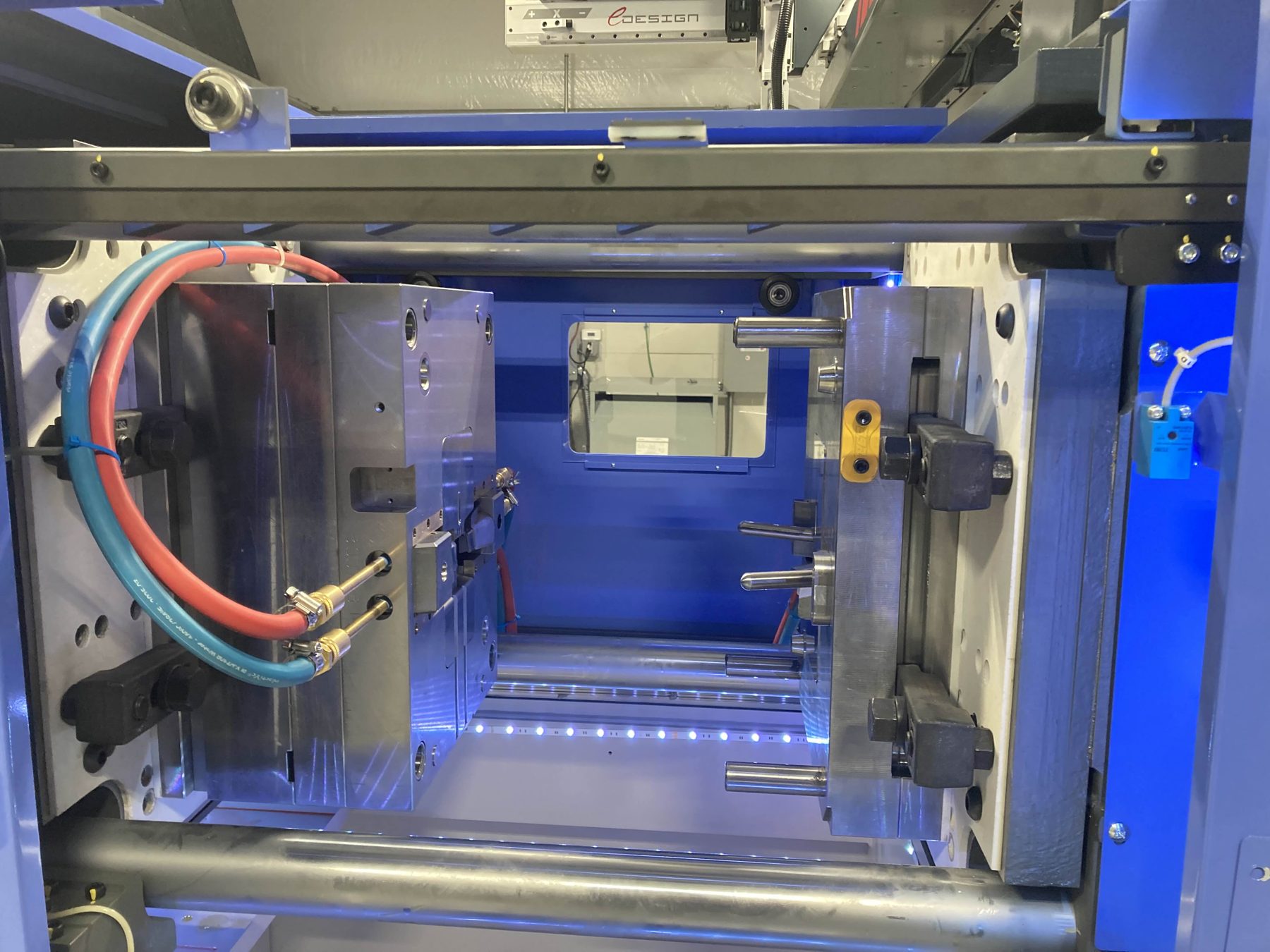 A mold built by Empire Tool mounted in an injection molding machine